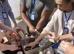 group-different-people-volunteering-foodbank-poor-people