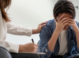 man with mental health problems is consulting. psychiatrist is recording the patient's condition for treatment. encouragement, love and family problem, bipolar , depression patient, protect suicide